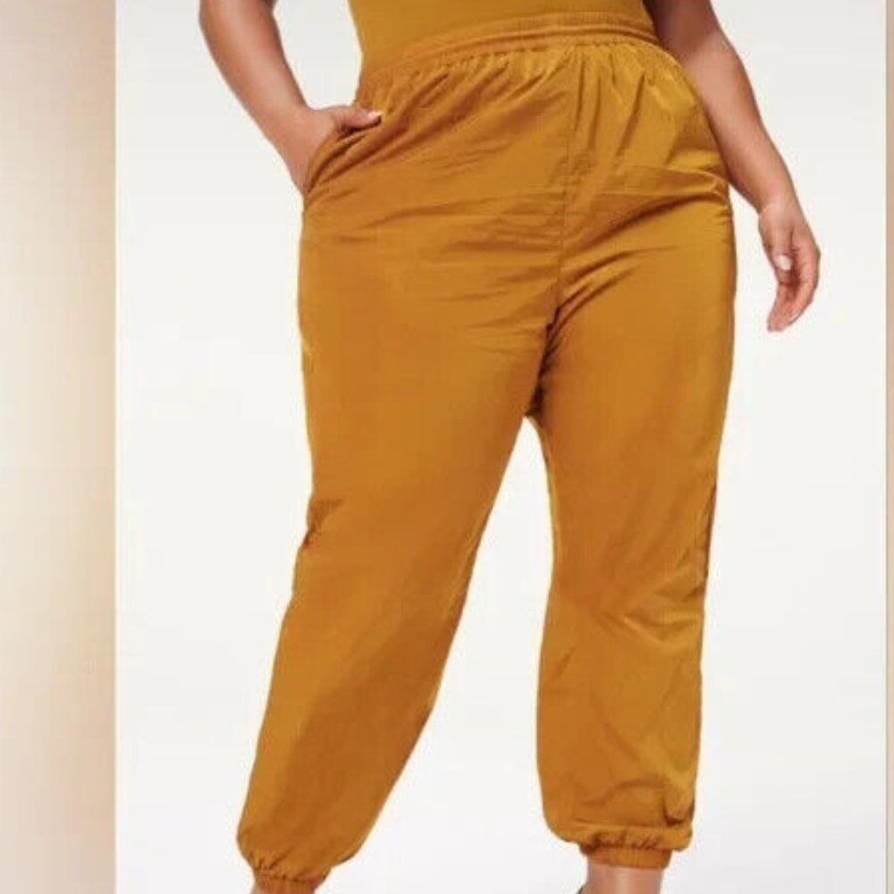 Good American Mustard Track Pants